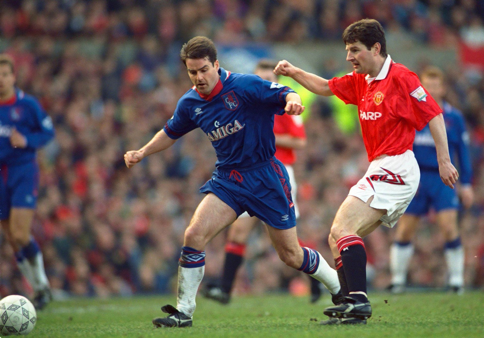 Manchester United v Chelsea 5/3/94 F.A.Premiership<br /> Pic : Action Images / John Sibley<br /> Chelsea's Steve Clarke takes on Manchester United's Denis Irwin